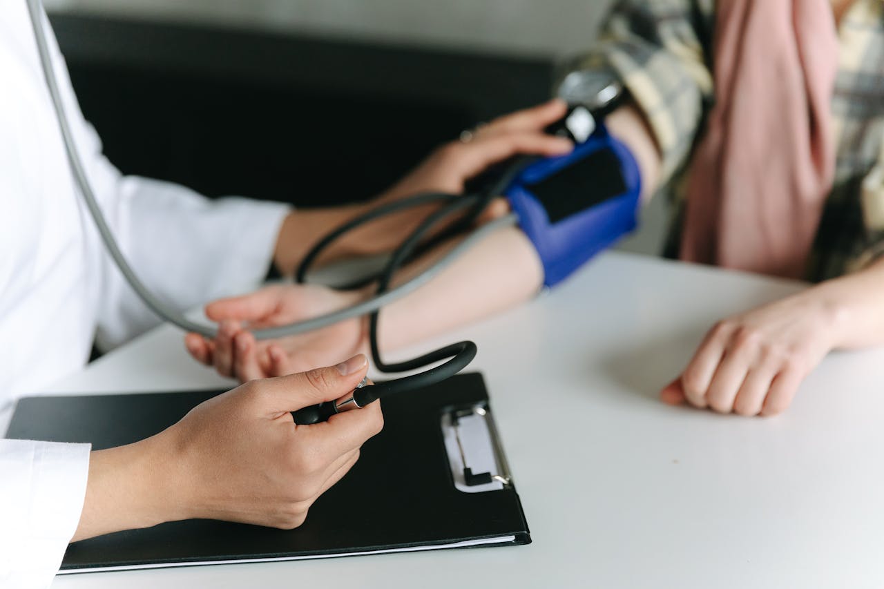 Friendly doctor speaking with a patient at Ann Arbor Urgent Care